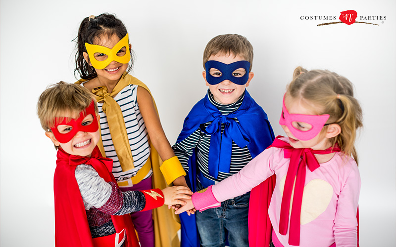 Preschoolers wearing superhero costumes for creative learning.